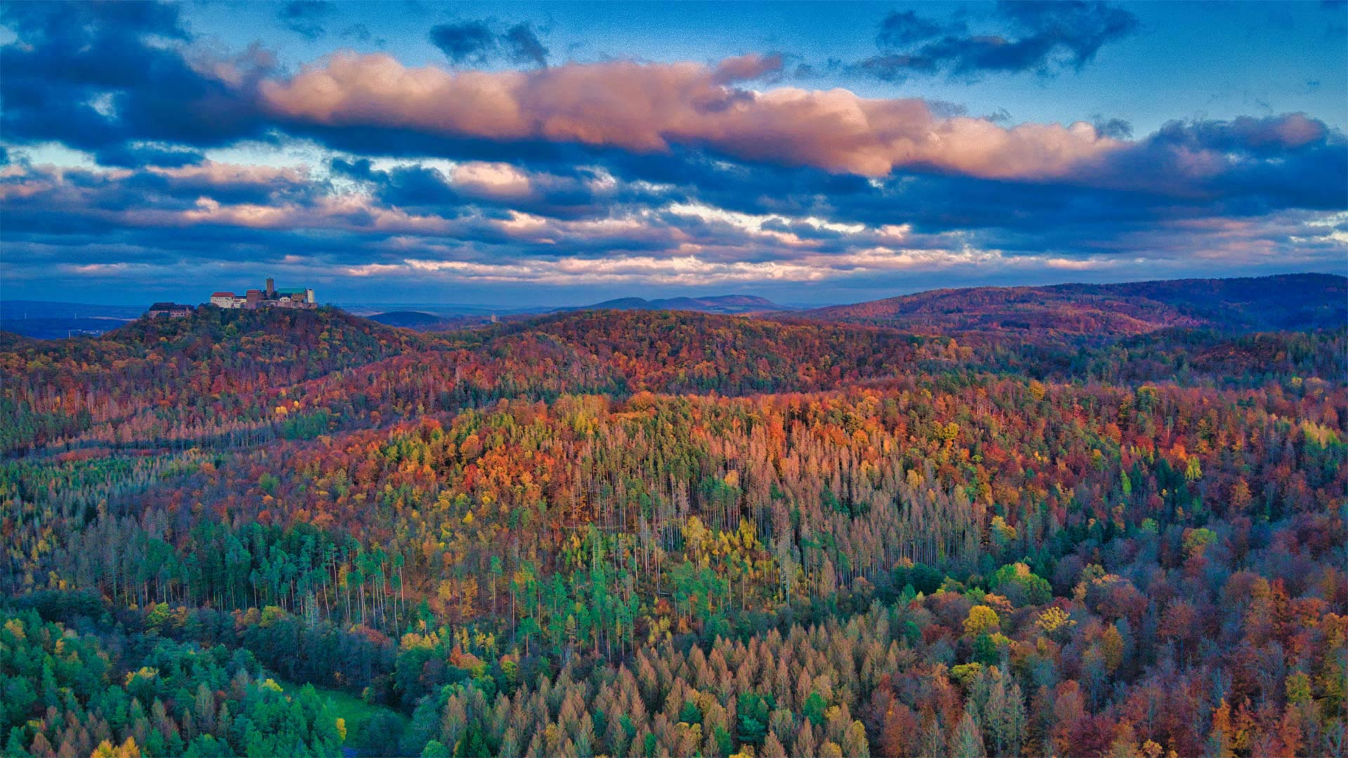 Thuringian Forest in autumn with Wartburg Castle