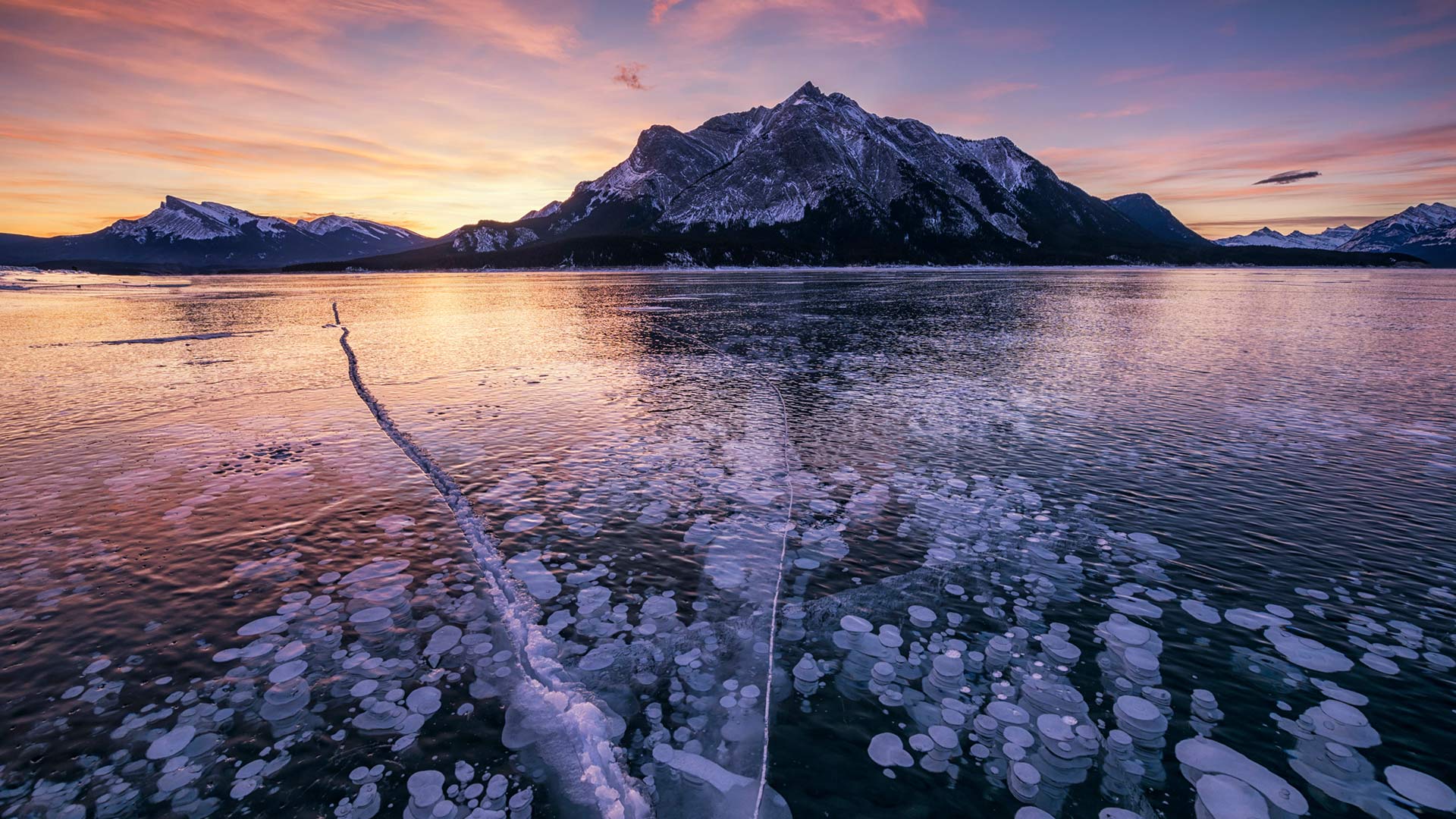 Mount Michener and a frozen Abraham Lake in Alberta