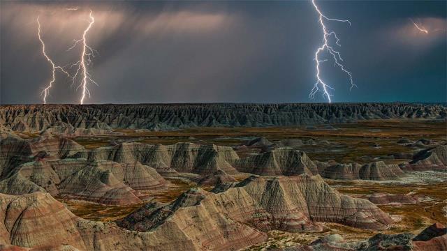 Rock formations in Badlands National Park during a lightning storm